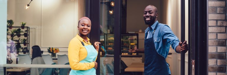 2 Business Owners welcoming you to their business