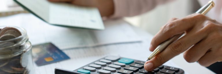 UK small business owner reviewing financial projections for a loan application